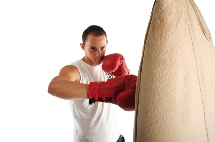 Boxing Gloves - impacting bag